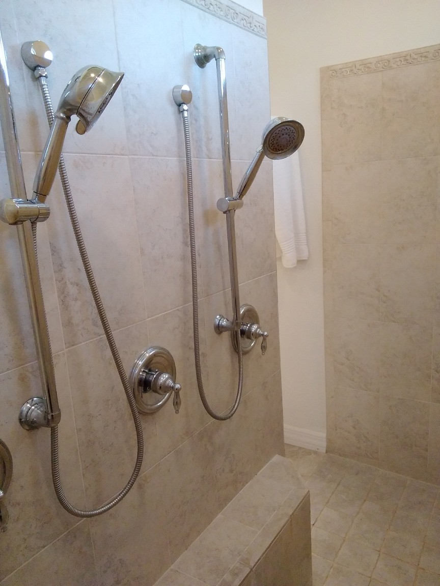 Main Bath Adjustable Moen Shower Heads in Walk-In Shower