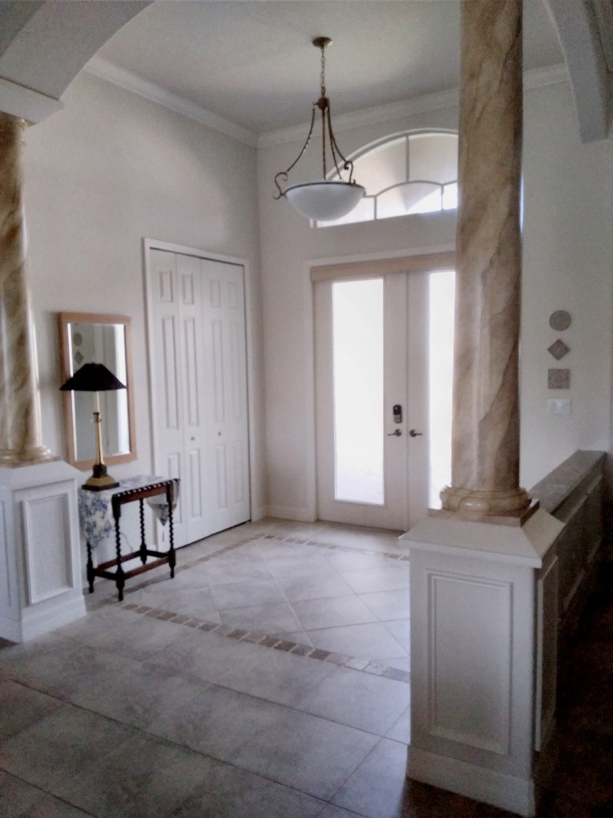 Entry Decorative Pillars, Floor Tile, and Frosted Glass Doors
