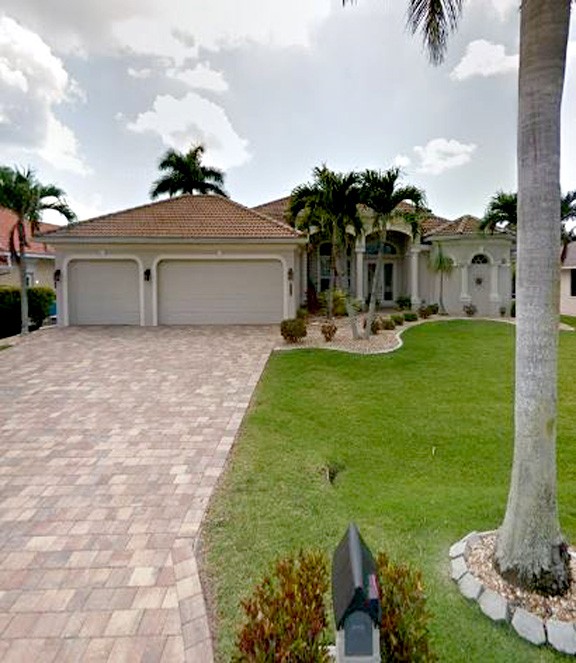 Front Yard and Paver Driveway