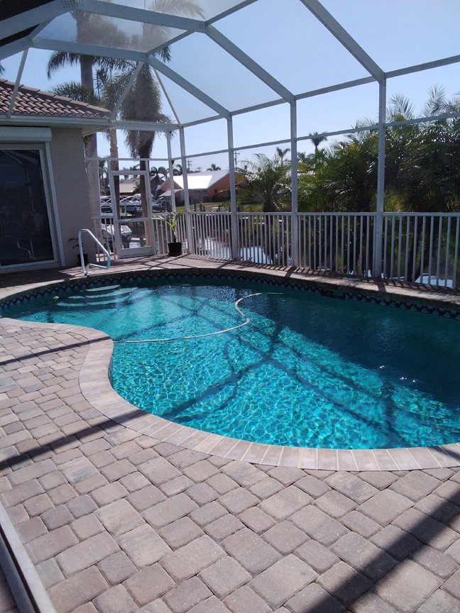 1442 SW 54th Terrace, Cape Coral, FL 33914 Spa and Pool with pavers
